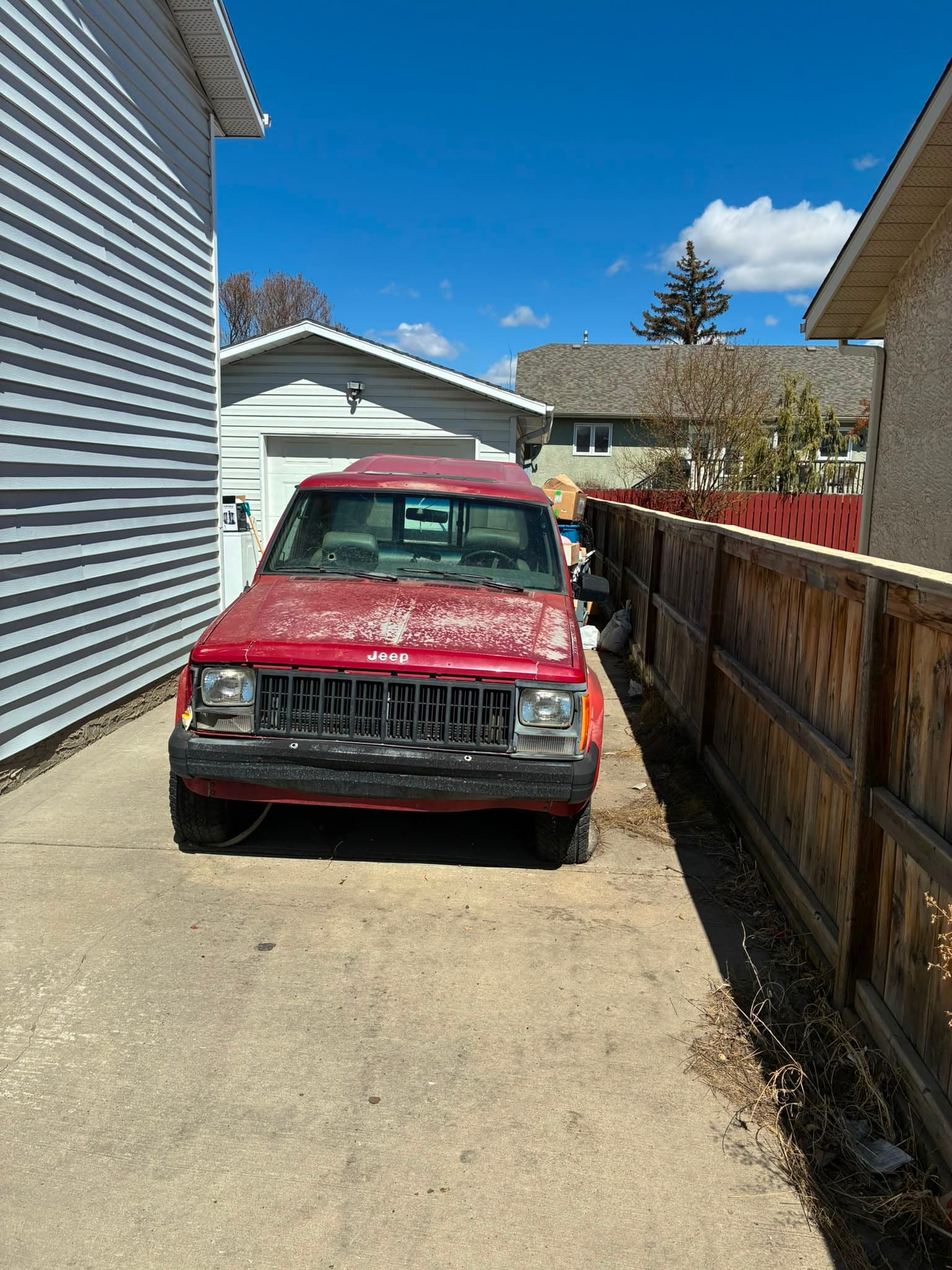 Older vehicle ready for cash pickup near Eckville