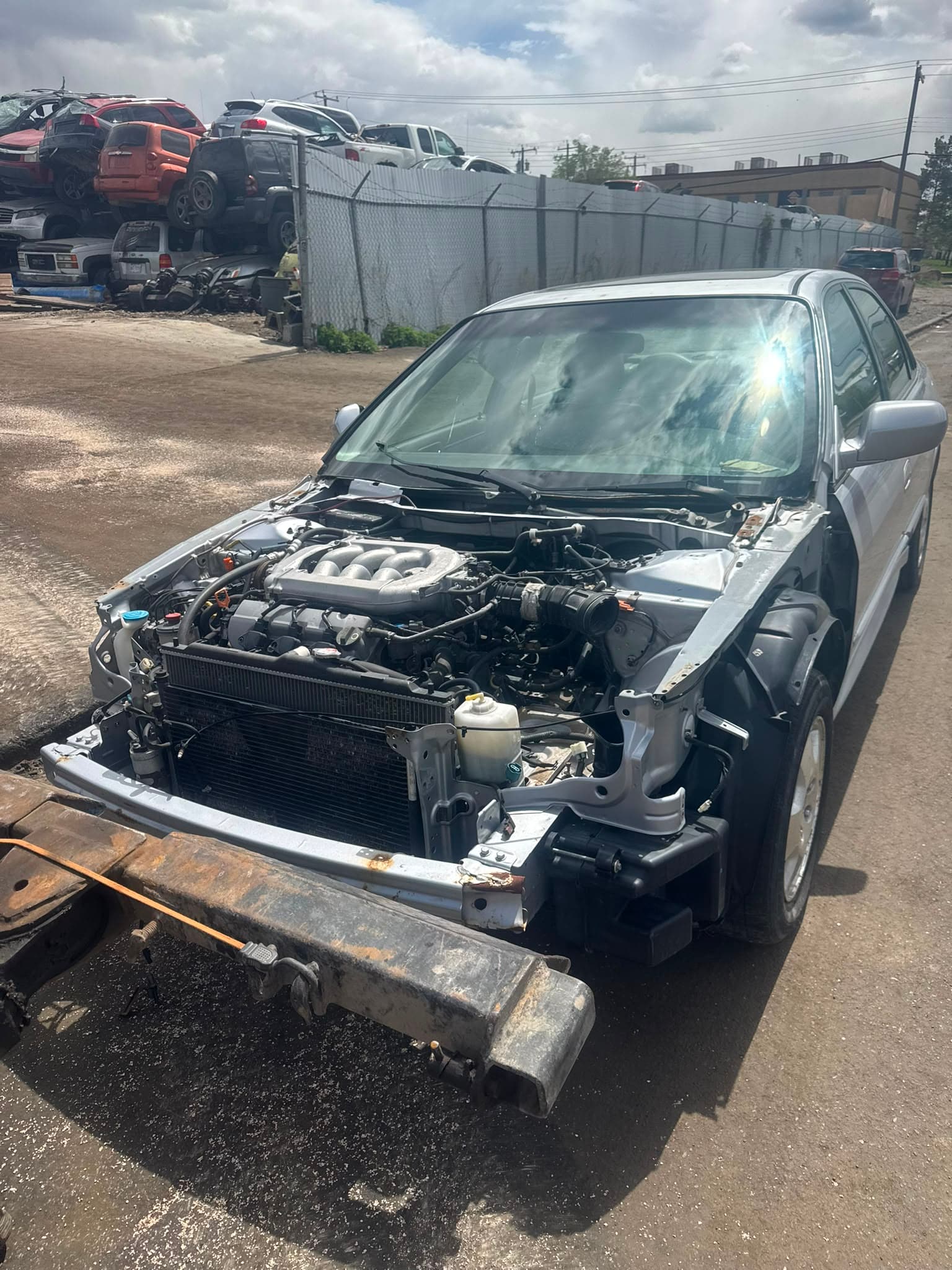 Incomplete sedan accepted for junk and scrap car removal