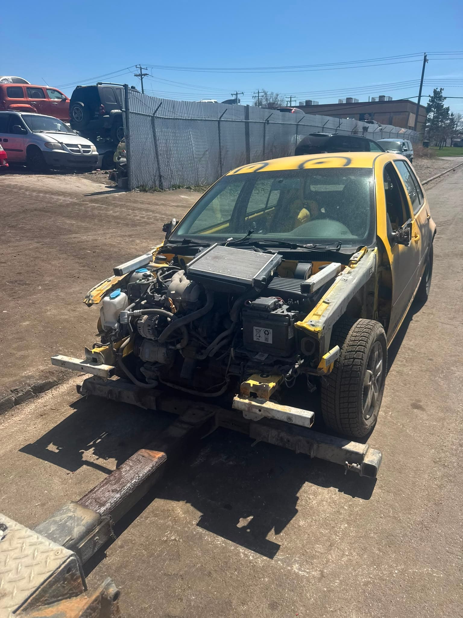 Vehicle being dismantled for responsible parts and metal recycling